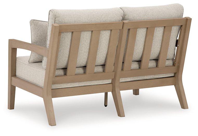 Hallow Creek Outdoor Loveseat with Cushion - Just Furniture (PA) - Multi Location